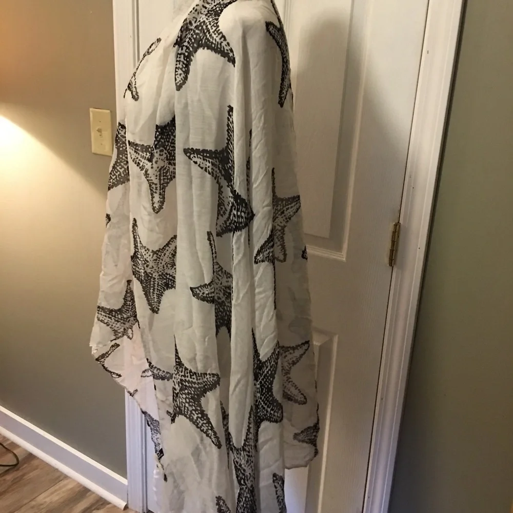 No brand name on this novelty scarf wrap. Is NWT. Sea star, starfish print.